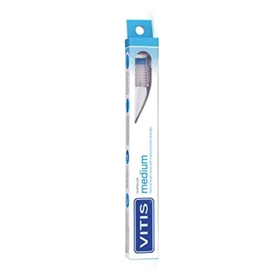 Afbeelding van Vitis Medium Tandenborstel met Tandpasta 1 stuk + 15 ml
