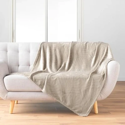 Afbeelding van douceur d&#039;intérieur, Knuffeldeken (125 x 150 cm) Nelia Taupe, effen reliëf flanel