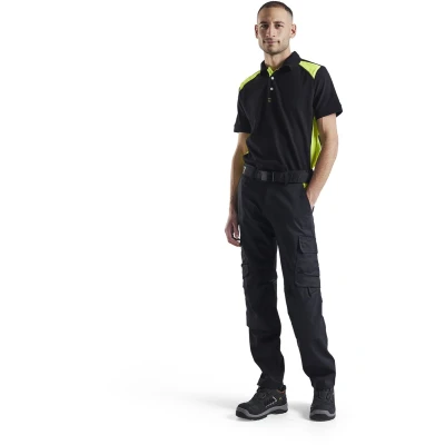 Afbeelding van Blaklader Industrie werkbroek stretch met kniezakken 1448 1832 Zwart/High Vis Geel D112