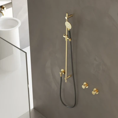 Afbeelding van HotBath Cobber glijstang 90cm met wandaansluitbocht 150cm doucheslang en ronde handdouche messing Gepolijst PVD