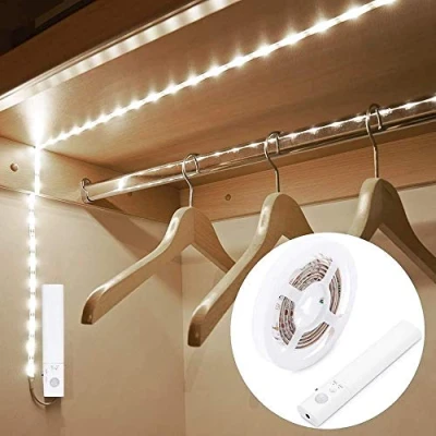 Afbeelding van Motion Sensor Garderobe Licht, OriFiil 2M LED Strip Lights Nachtlampje, 6000K koud Wit, Auto on/Off, Batterij Aangedreven voor kast, keuken, trap, onder bedverlichting (2M wit)