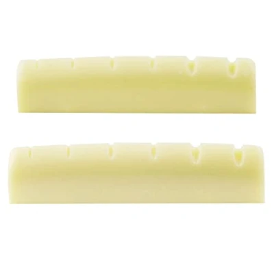 Afbeelding van Musiclily Pro Ureumhars Kunststof 43mm Slotted Topkam Les Paul stijl Platte Bodem voor 6 snarige Single Cut of Akoestische Gitaar,Ivoor(2 Stuks)