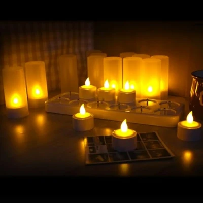 Afbeelding van LED Oplaadbaar Vlamloos Theelichtje QSPORTPEAK Flikkerende Theelichtkaarsen Witte basis met laadstation, geschenkdecoratie voor feestvakantie, Halloween, kerst van 12 (geel afstandsbediening)