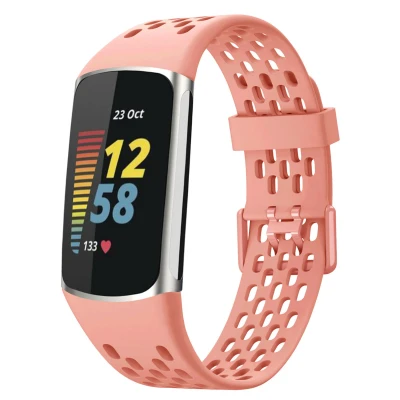 Afbeelding van Siliconen sport bandje met gaatjes voor de Fitbit Charge 5 / 6 Peach imoshion Oranje En TPU (zacht)