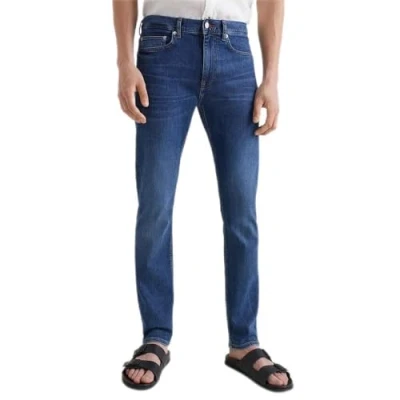 Afbeelding van Tommy Hilfiger heren Bleecker slim fit jeans met medium wassing in de kleur Indigo, maat: W35/L36