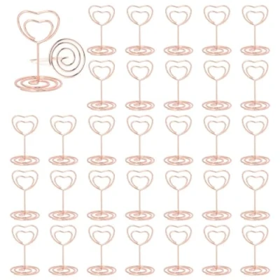 Afbeelding van ZYEKIU 30 stuks roségouden plaatskaarthouders, fotohouder, kaartenstandaard, menukaarthouder, fotohouder met clips, memohouder, plaatskaarthouder, voor bruiloften, banketten, feesten (hartvormig)