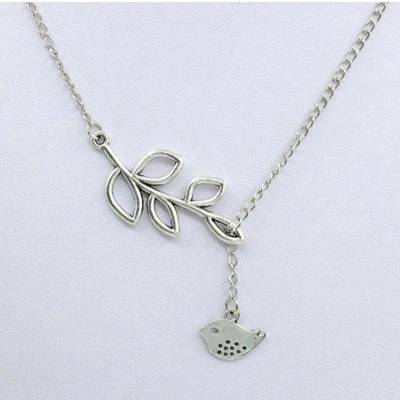 Afbeelding van Ketting met hanger blad en vogeltje.