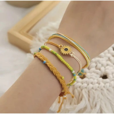 Afbeelding van Jomide Armbandjes Set Zonnebloem 4 stuks