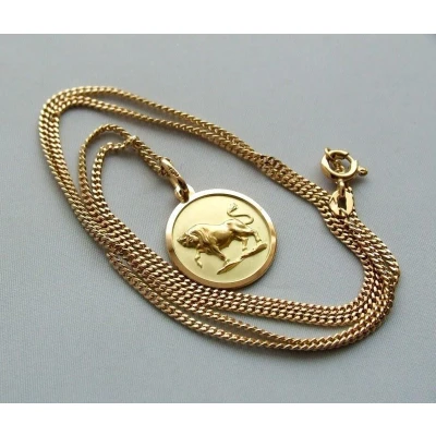 Afbeelding van Gouden collier met stier hanger