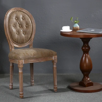 Afbeelding van Lot van 2 Louis XVI stoelen in medaillonstijl, gepatineerd hout en simili getuft taupe Menzzo