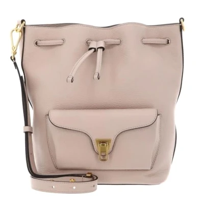 Afbeelding van COCCINELLE Leren schoudertas Beat Generatio Bucket Bag Rosette beige