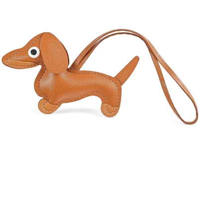 Afbeelding van Lederen sleutelhanger teckel puppy geluksbrenger geel leer