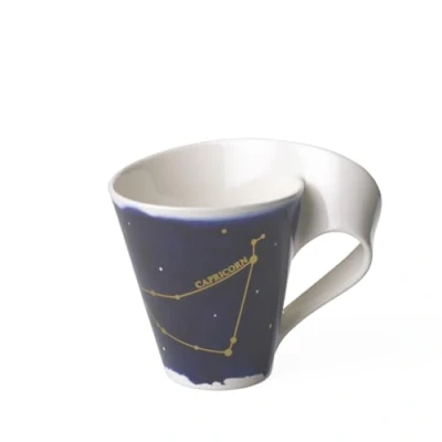 Afbeelding van Villeroy en Boch NewWave Stars beker met handvat, mooi gevormde mok steenbok motief, premium porselein, vaatwasmachinebestendig, wit/blauw, 300 ml, 1 stuk (1 stuk)