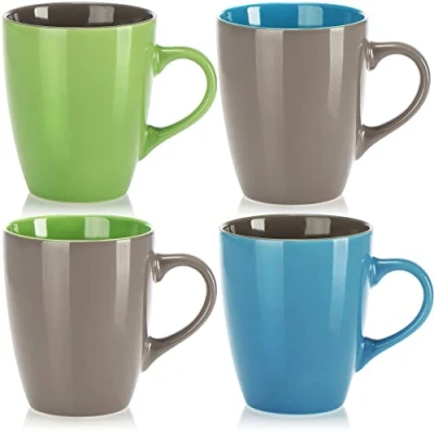 Afbeelding van COM FOUR® 4x keramische koffiekopjes koffiekan voor koude en warme dranken in modern design beker met gekleurd handvat drinkbeker 300 ml (04 stuks blauw/groen/grijs)