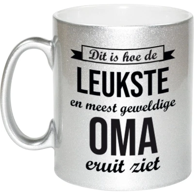 Afbeelding van Leukste en meest geweldige oma cadeau mok / beker zilverglanzend 330 ml feest mokken