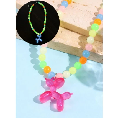 Afbeelding van Ketting met glow in the dark kralen hanger hondje