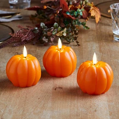 Afbeelding van Lights4fun TruGlow® pompoenkaarsen, oranje, met warmwitte ledvlam, timer, set van 3