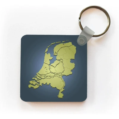 Afbeelding van Sleutelhanger Uitdeelcadeautjes Illustratie van Nederland tegen een donkerblauwe achtergrond. Plastic