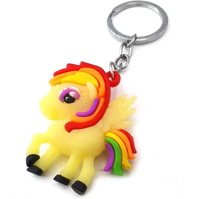Afbeelding van New Age Devi Kinder sleutelhanger tashanger unicorn van siliconen geel multicolor regenboog met keyring 5x5 cm