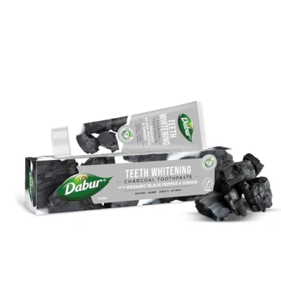 Afbeelding van Dabur Tandenwitmakende houtskooltandpasta 100 ml met biologische zwarte peper en gember