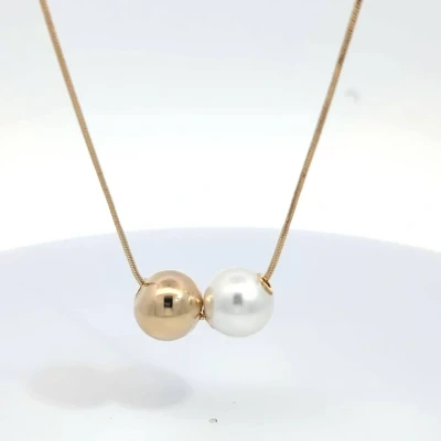 Afbeelding van Dunne gouden ketting met witte en parelmoer kleurige bal