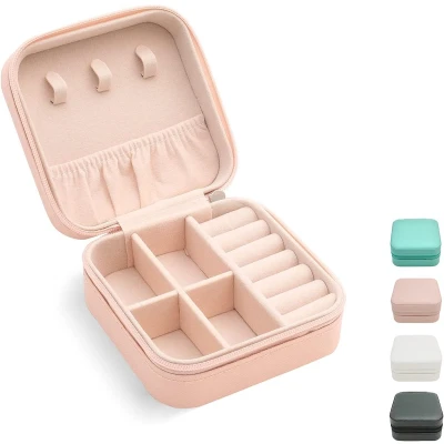 Afbeelding van Mini sieraden reisdoos Sieradendoos Kleine reis draagbare displaydoos Doos opbergdoos Perfect voor ringen, oorbellen, kettingen en cadeaus Roze