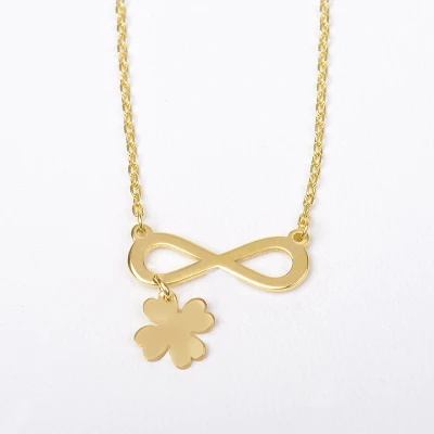 Afbeelding van MeYuKu Sieraden 14 karaat gouden ketting met infinity en klavertjevierhanger