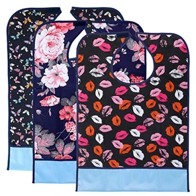 Afbeelding van BTSKY 3 Stks Waterdichte Herbruikbare Slabbetjes voor Volwassenen Wasbare Maaltijd Protector Bib Kleding met Kruimelvanger (Bloem+Lip+Vlinder)