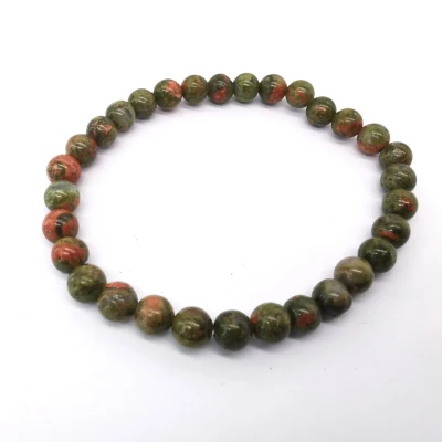 Afbeelding van Armband Edelsteen Unakiet 6mm Kralen 18 cm Werking aardend, kalmerend en inzichtgevend.
