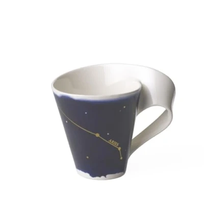 Afbeelding van Villeroy en Boch NewWave Stars beker met handvat, mooi gevormde mok Ram motief, premium porselein, vaatwasmachinebestendig, wit/blauw, 300 ml, 1 stuk (1 stuk)