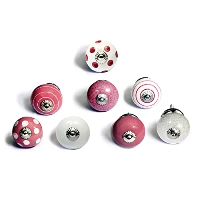 Afbeelding van Set van 8 keramische knoppen in wit en roze, met de hand geschilderd verschillende ontwerpen. Handgemaakte handvatten voor kasten, laden dressoirs. Klassieke 40 mm diameter.