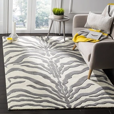 Afbeelding van SAFAVIEH Dierenprint tapijt voor woonkamer, eetkamer, slaapkamer Cambridge Collection, korte pool, ivoor en donkergrijs, 91 x 152 cm