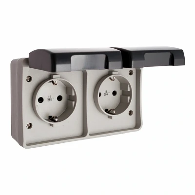 Afbeelding van Plug in basis EDM Met deksel Dubbel Waterdicht Grijs Oppervlak 250 V 16 A IP44