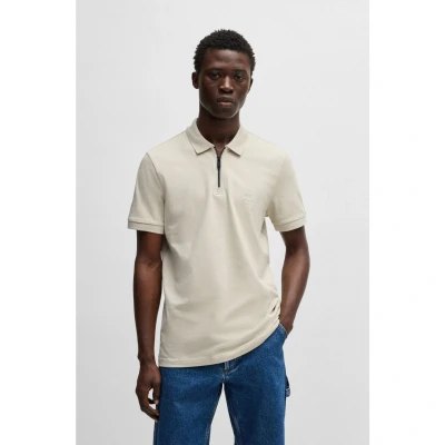 Afbeelding van HUGO BOSS heren Regular fit polo van piqué katoen met halve rits in de kleur Beige, maat: L