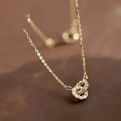 Afbeelding van 925 Sterling Zilveren Damesketting Met Dubbele Ring Hanger Goudkleurig Tijdloos Ontwerp