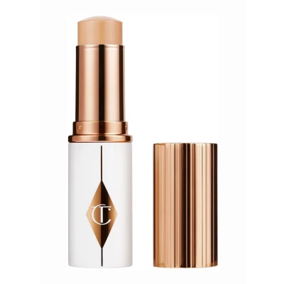 Afbeelding van Charlotte Tilbury Unreal Skin Sheer Glow Tint Hydrating Foundation Stick 7.5 Medium 9 gram