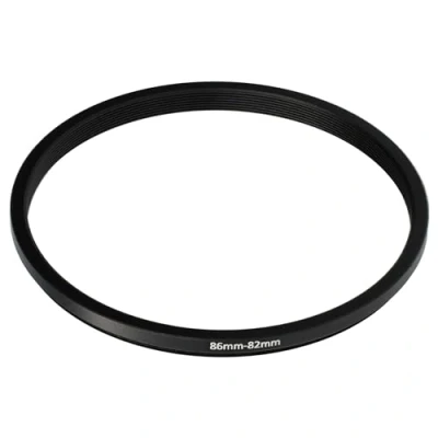 Afbeelding van vhbw Step down ring adapter van 86 mm naar 82 voor cameralens filteradapter, metaal, zwart