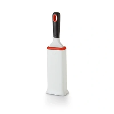 Afbeelding van Oxo Good Grips pluizenborstel met houder