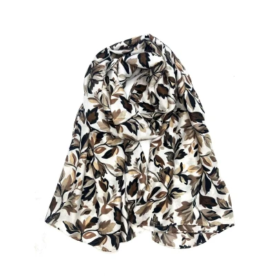 Afbeelding van Lange dames sjaal Elsa gebloemd motief beige zwart bruin taupe goud