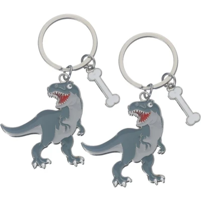 Afbeelding van 2x stuks metalen dinosaurus t rex sleutelhanger 5 cm Dino fans cadeau artikelen
