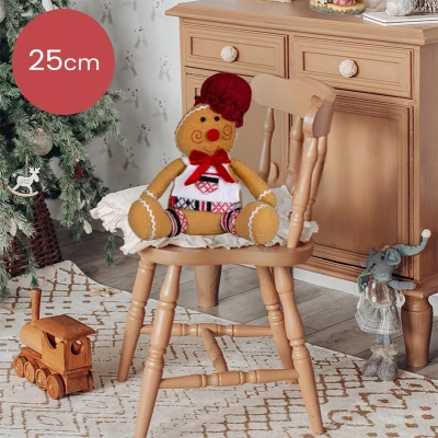 Afbeelding van Schattige handgemaakt peperkoek figuur met rode muts en strik 25(30)cm