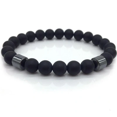 Afbeelding van Zwarte kralenarmband van onyx en hematiet