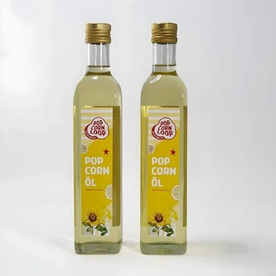 Afbeelding van Popcornolie voor maïs, 2 x 500 ml flessen, hoog verhit boter, oliegehalte met boteraroma, botersmaak, olie, omega, verhitte braadolie, popcornmachine, suiker, zout, koolzaadolie,