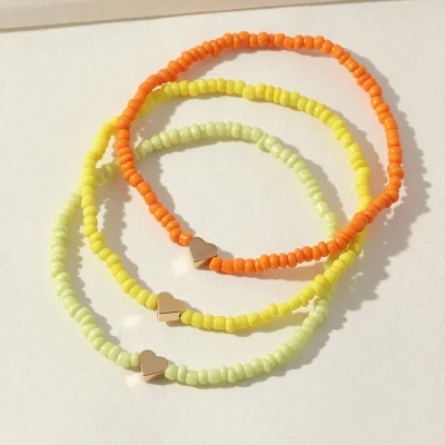 Afbeelding van Jomide Enkelbandjes Kralen Geel/Lichtgeel/Oranje 3 stuks