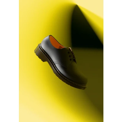 Afbeelding van Dr. Martens Unisex Adult 1461 Pw Amfibieën, Zwart Splatter Glad, 41 EU