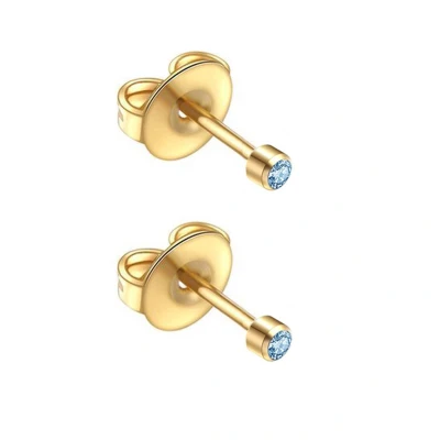 Afbeelding van Caflon 2mm mini goudkleurige stalen oorknopjes voor oorschieter hypoallergeen steriel verpakt met licht blauw steentje geboortesteen maart