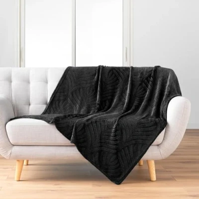 Afbeelding van douceur d&#039;intérieur, Plaid (125 x 150 cm) Nelia zwart, flanel, reliëf, effen