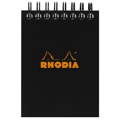 Afbeelding van Rhodia 115009C spiraalbindingsblok (spiraalbinding) zwart, A7 (7,4 x 10,5 cm), 80 uitneembare bladen, 5 cm, Clairefontaine wit papier, g/m2 kleine tegels mm (7,4x10,5 cm) zwart.