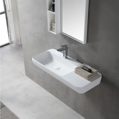 Afbeelding van Wastafel 90 cm mat wit solid surface Wahlbach