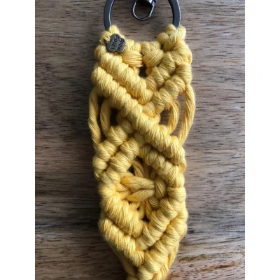 Afbeelding van sleutelhanger design, macrame sleutelhanger, geknoopte geel